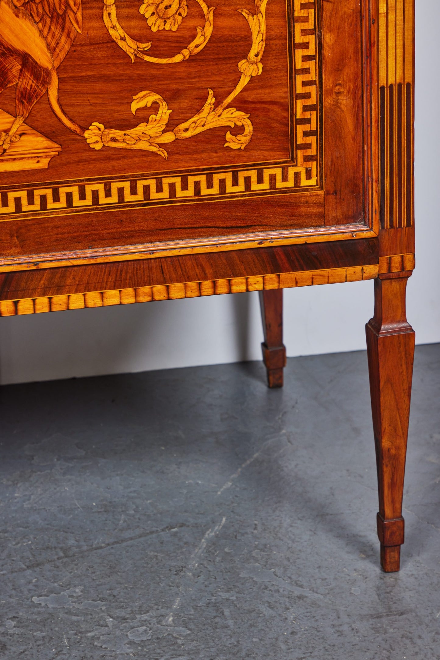 Pair of Royal Crest of Modena Commodes
