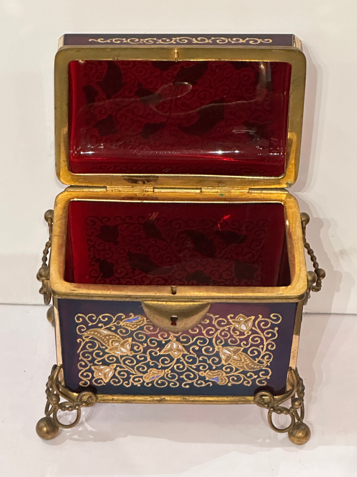 Hinged Cranberry Glass Box with Enamel Decoration and Gilded Bronze Mounts. 19th Century