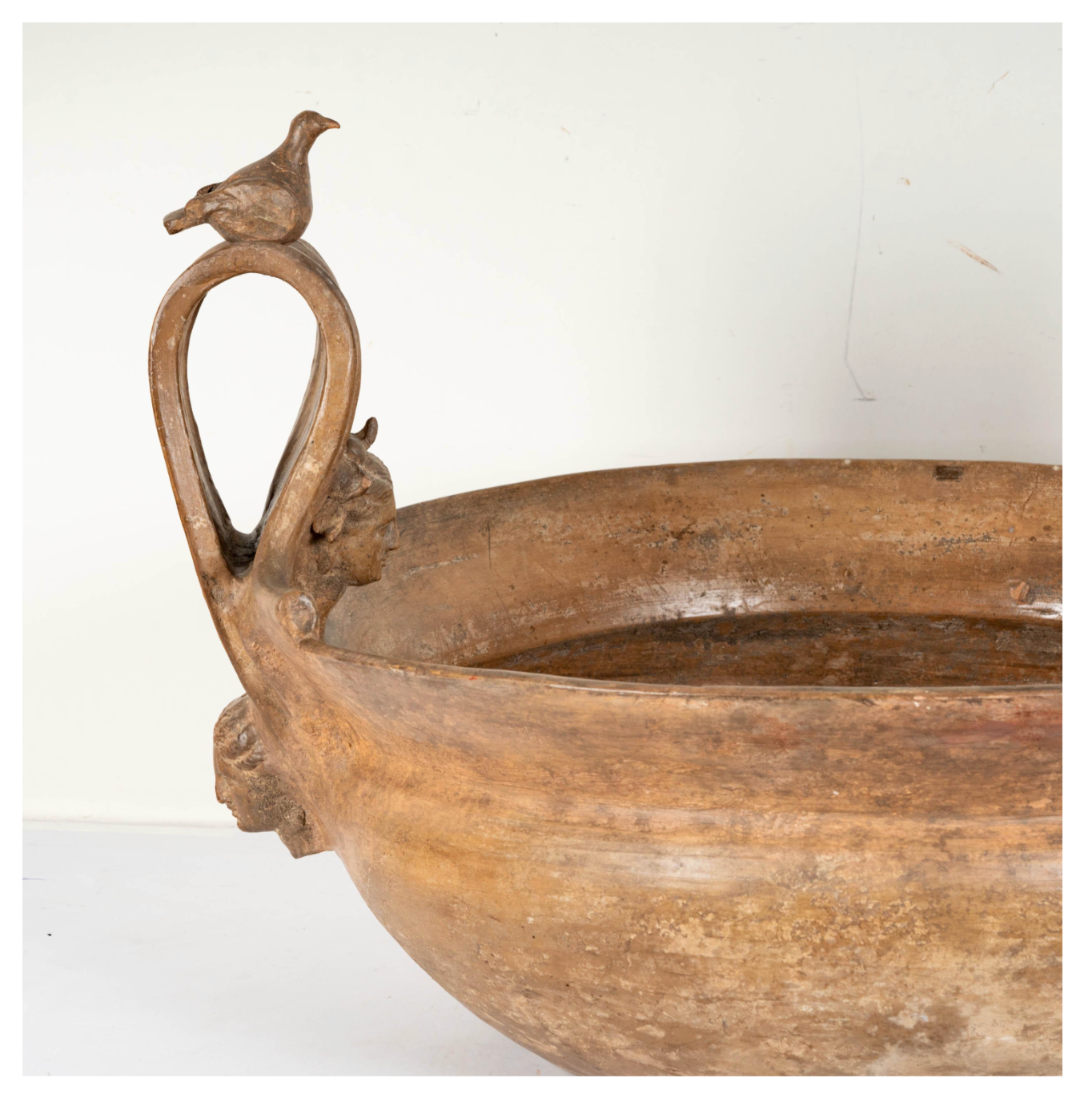 Charming Terracotta Basin with Faces and Animal Detail
