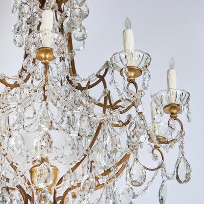 Matched Pair of Mid 20th Century Gilded and Crystal Chandeliers