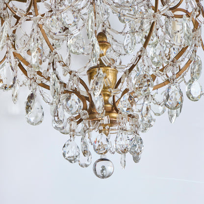 Matched Pair of Mid 20th Century Gilded and Crystal Chandeliers