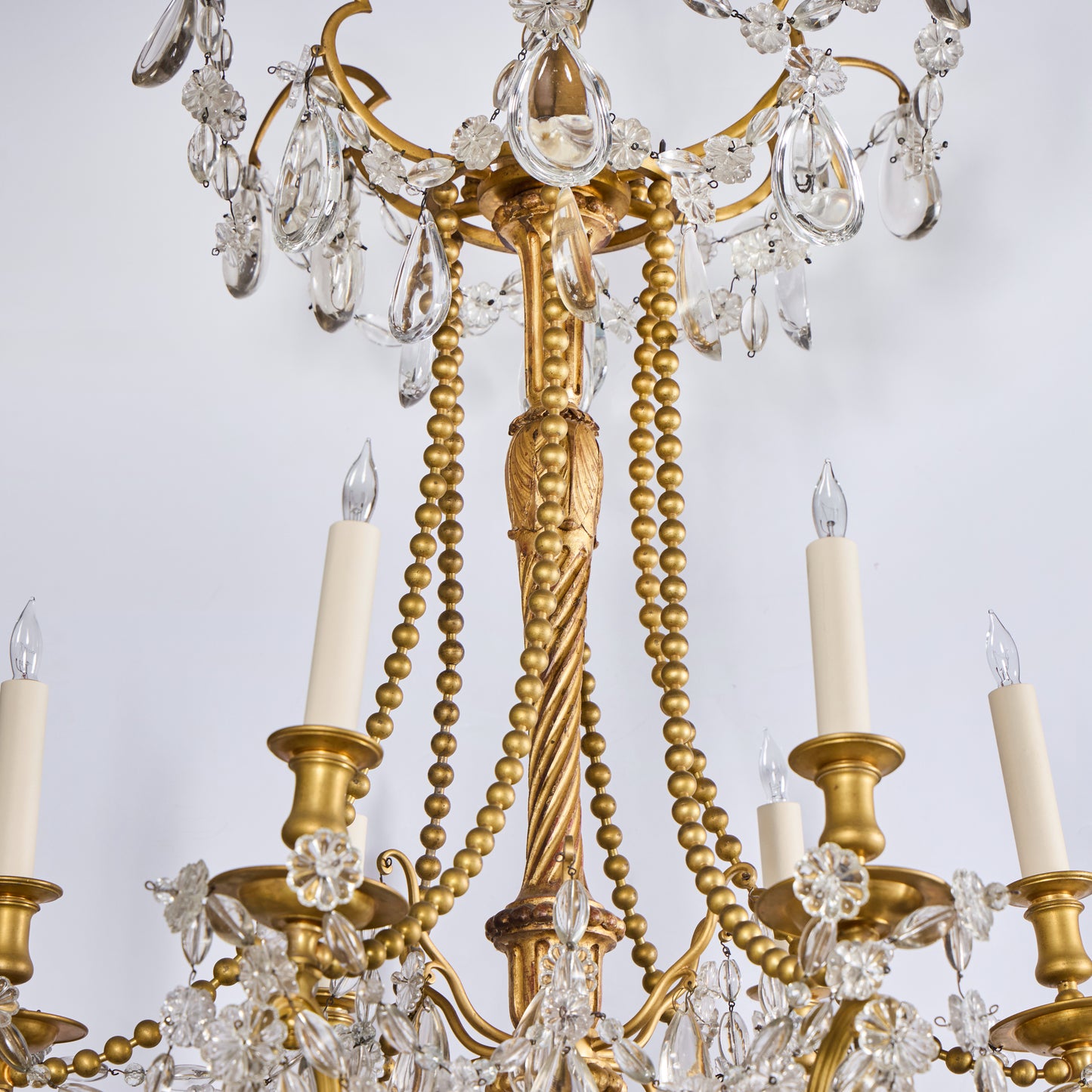 One of a Near Pair-Italian Gilded Bronze, Gilt-wood and Crystal Chandelier -19th century