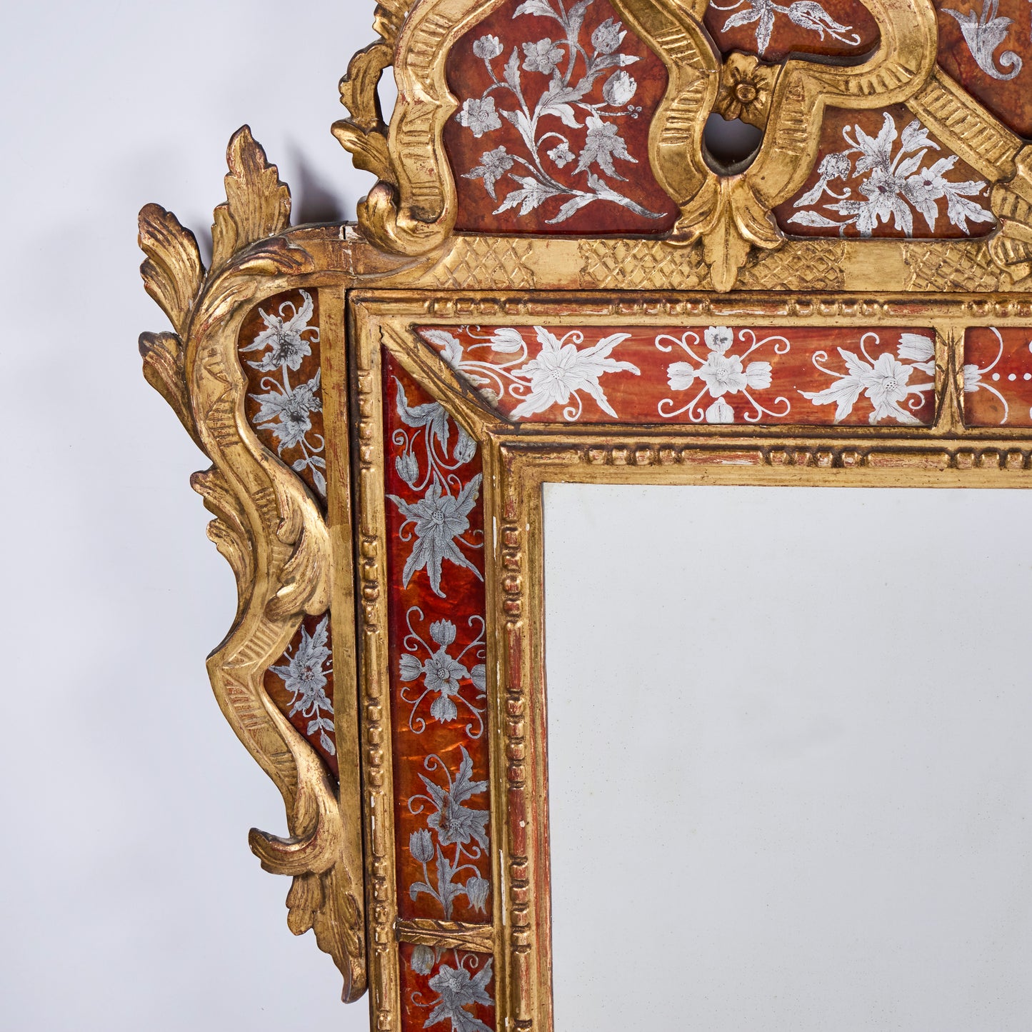 Italian Hand-Carved and Gilded Églomisé Mirror — 1920s