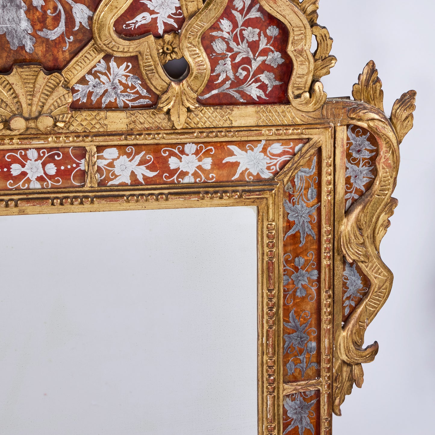Italian Hand-Carved and Gilded Églomisé Mirror — 1920s