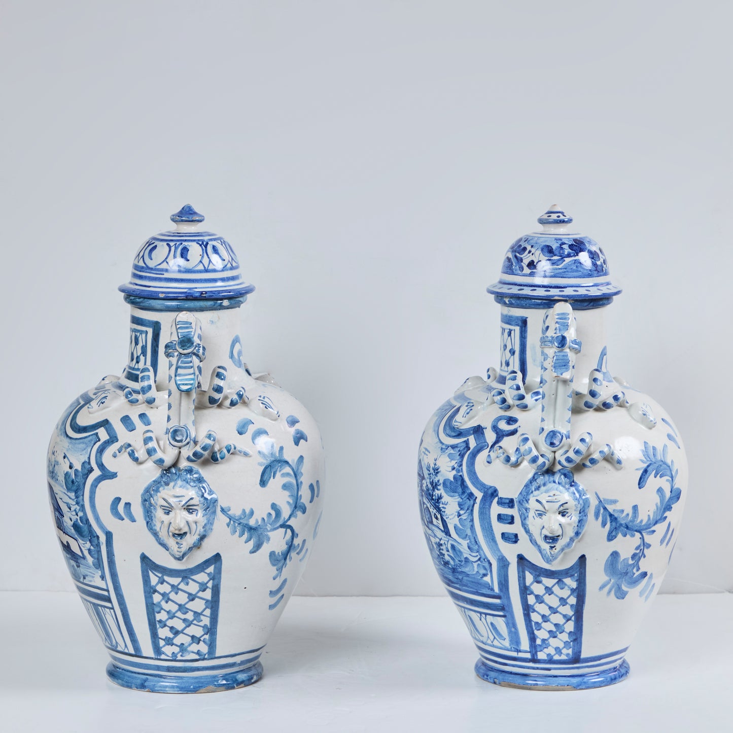 Pair of Faience Pottery Covered Jars