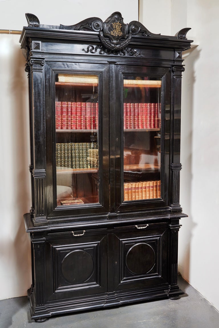 A Pair of Antique, Ebonized Bookcases