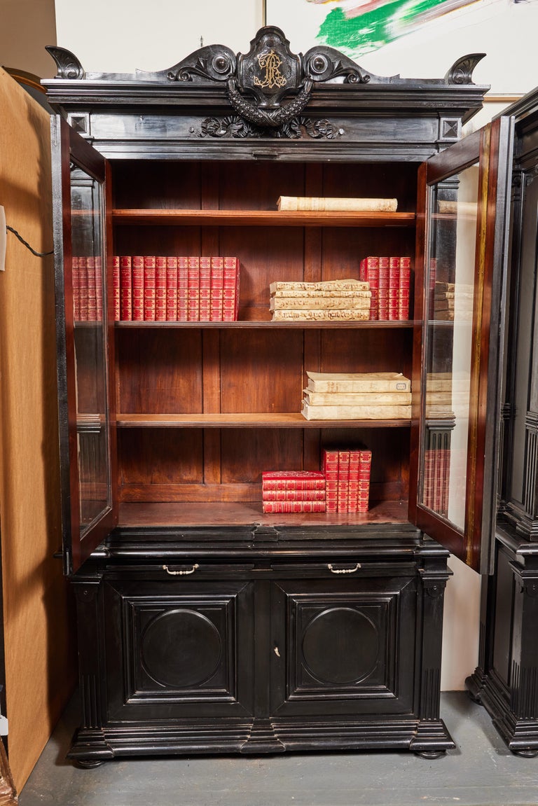 A Pair of Antique, Ebonized Bookcases