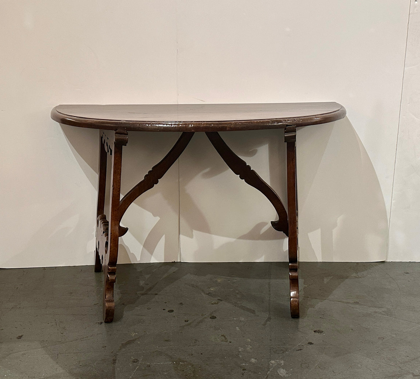 Pair of Late 1700's Walnut Trestle Leg Demi-lune Console Tables