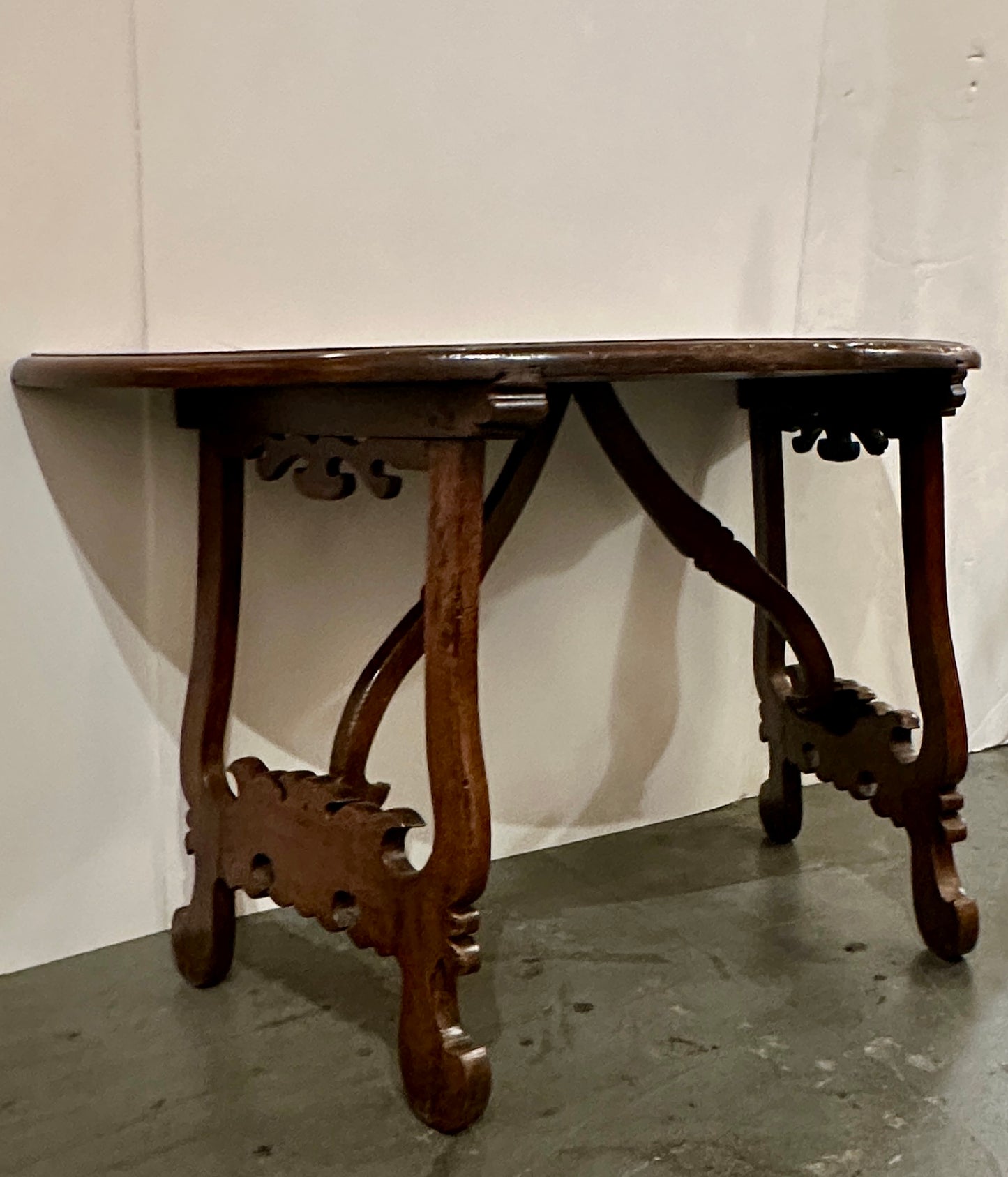 Pair of Late 1700's Walnut Trestle Leg Demi-lune Console Tables