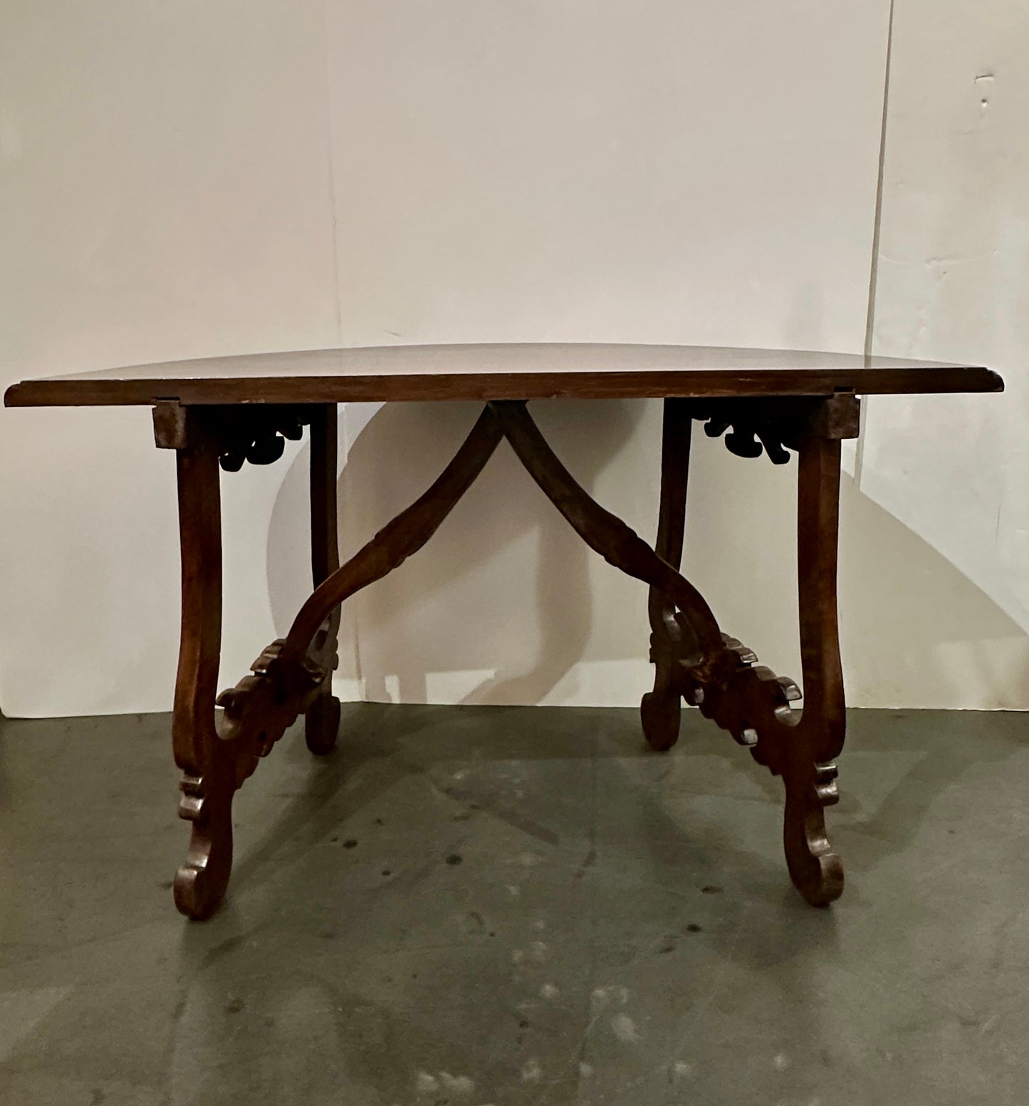 Pair of Late 1700's Walnut Trestle Leg Demi-lune Console Tables
