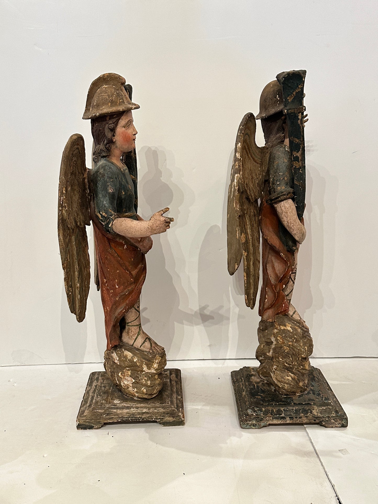 Pair of Hand-Carved and Polychromed Angel Sculptures. Circa 1785.