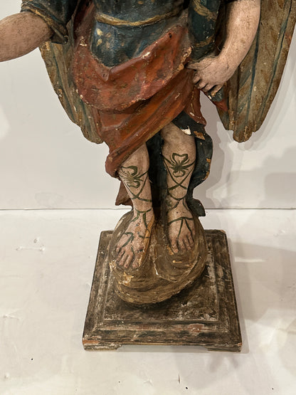 Pair of Hand-Carved and Polychromed Angel Sculptures. Circa 1785.