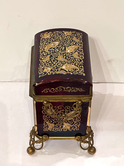 Hinged Cranberry Glass Box with Enamel Decoration and Gilded Bronze Mounts.  19th Century