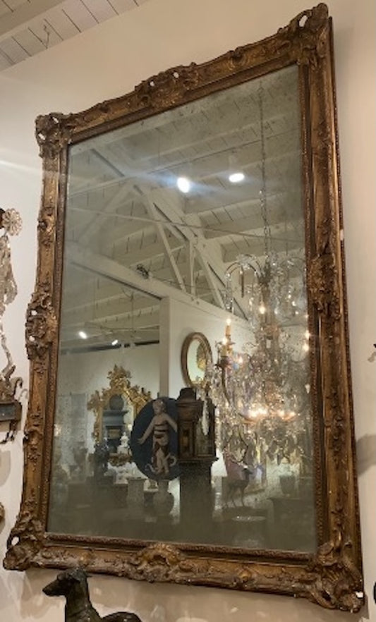 French, Hand-Carved and Gilded Mirror with Original Glass.  Circa 1850.