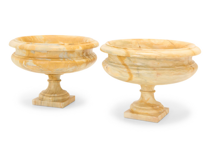 Pair of Large Hand-Carved Marble Urns on Classical Round Pedestals — 20th Century