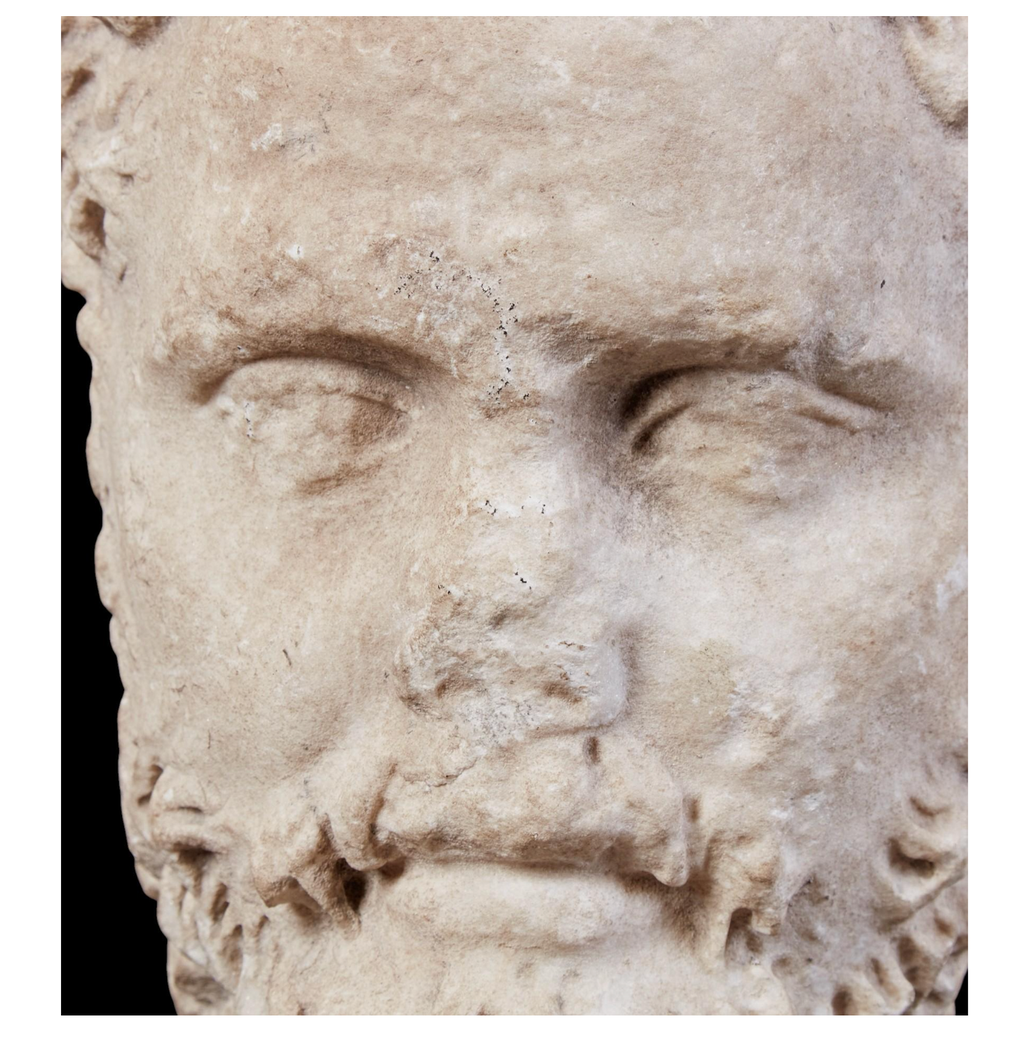 Roman Marble Head of a Bearded Man.  Roman Imperial Period, Late 2nd Century C.E.