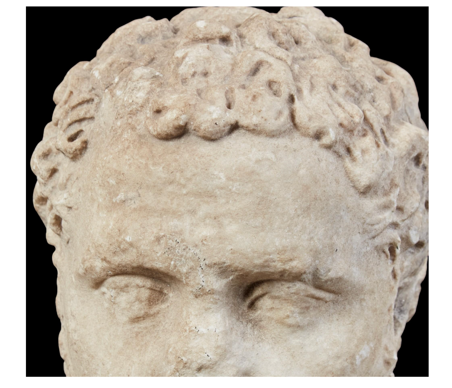 Roman Marble Head of a Bearded Man.  Roman Imperial Period, Late 2nd Century C.E.
