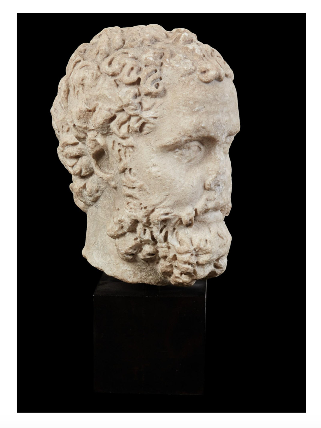 Roman Marble Head of a Bearded Man.  Roman Imperial Period, Late 2nd Century C.E.