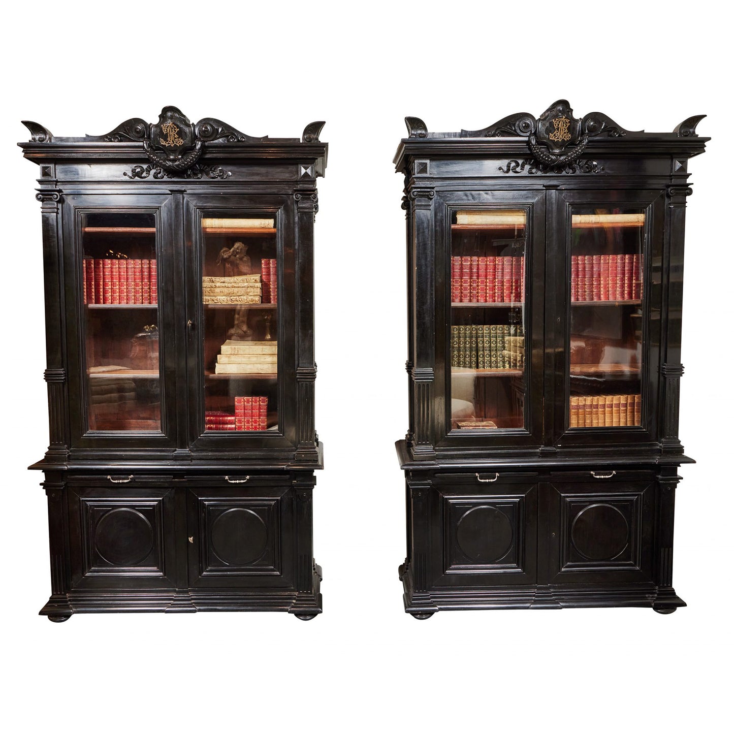 A Pair of Antique, Ebonized Bookcases