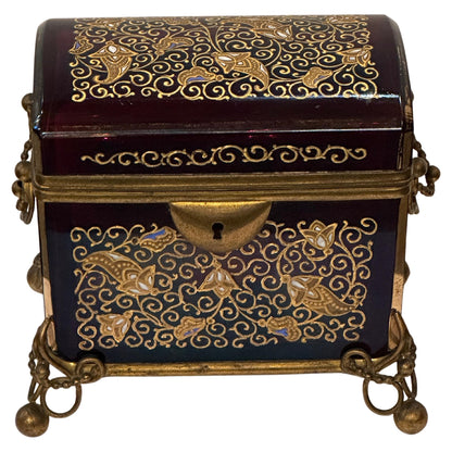 Hinged Cranberry Glass Box with Enamel Decoration and Gilded Bronze Mounts.  19th Century