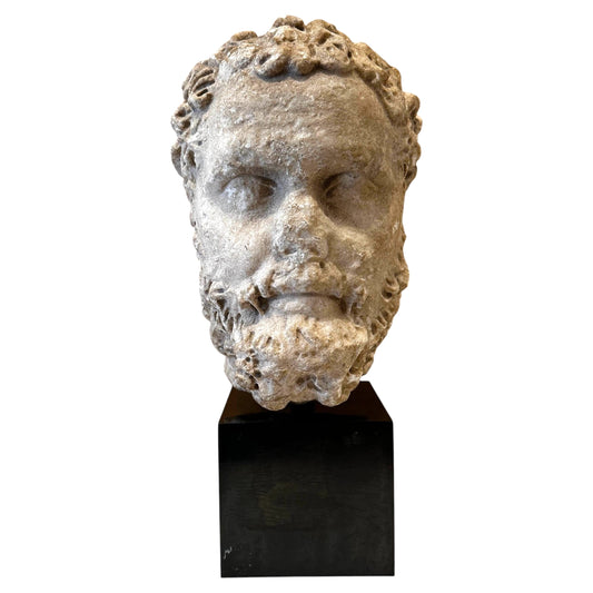 Roman Marble Head of a Bearded Man.  Roman Imperial Period, Late 2nd Century C.E.
